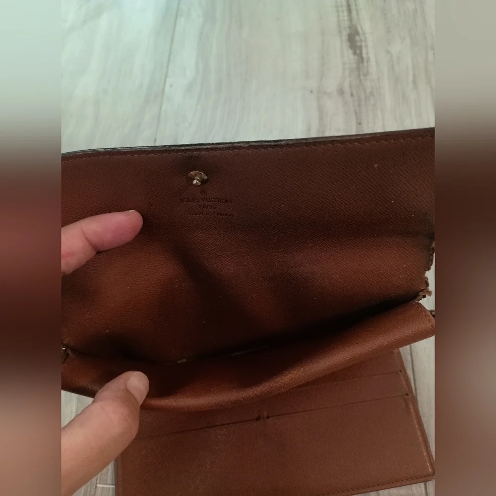 Authentic LOUIS VUITTON Monogram Porte Tresor International Trifold Wallet
